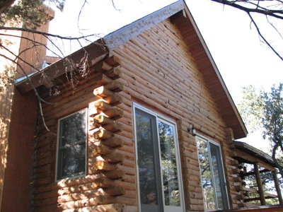 Log Cabin After Maintenance of Refinishing and Stained