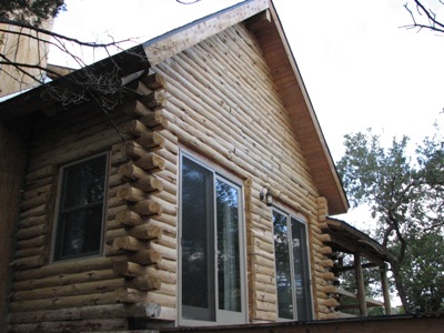 Log Cabin Before Maintenance of Refinishing and Stained